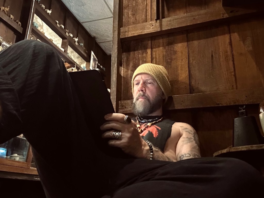 tattoo artist watson sketching in Thailand